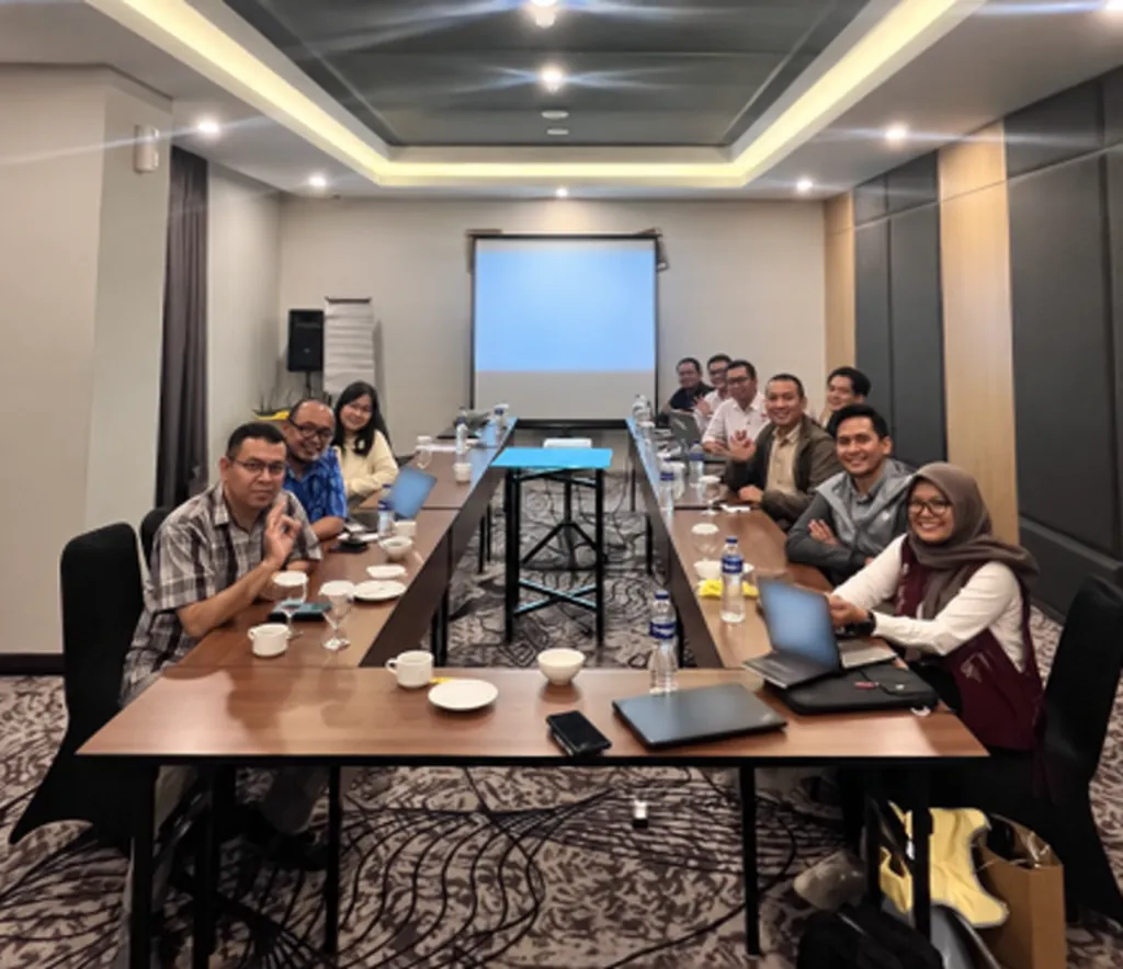 Project team gathered for an HSE review session.